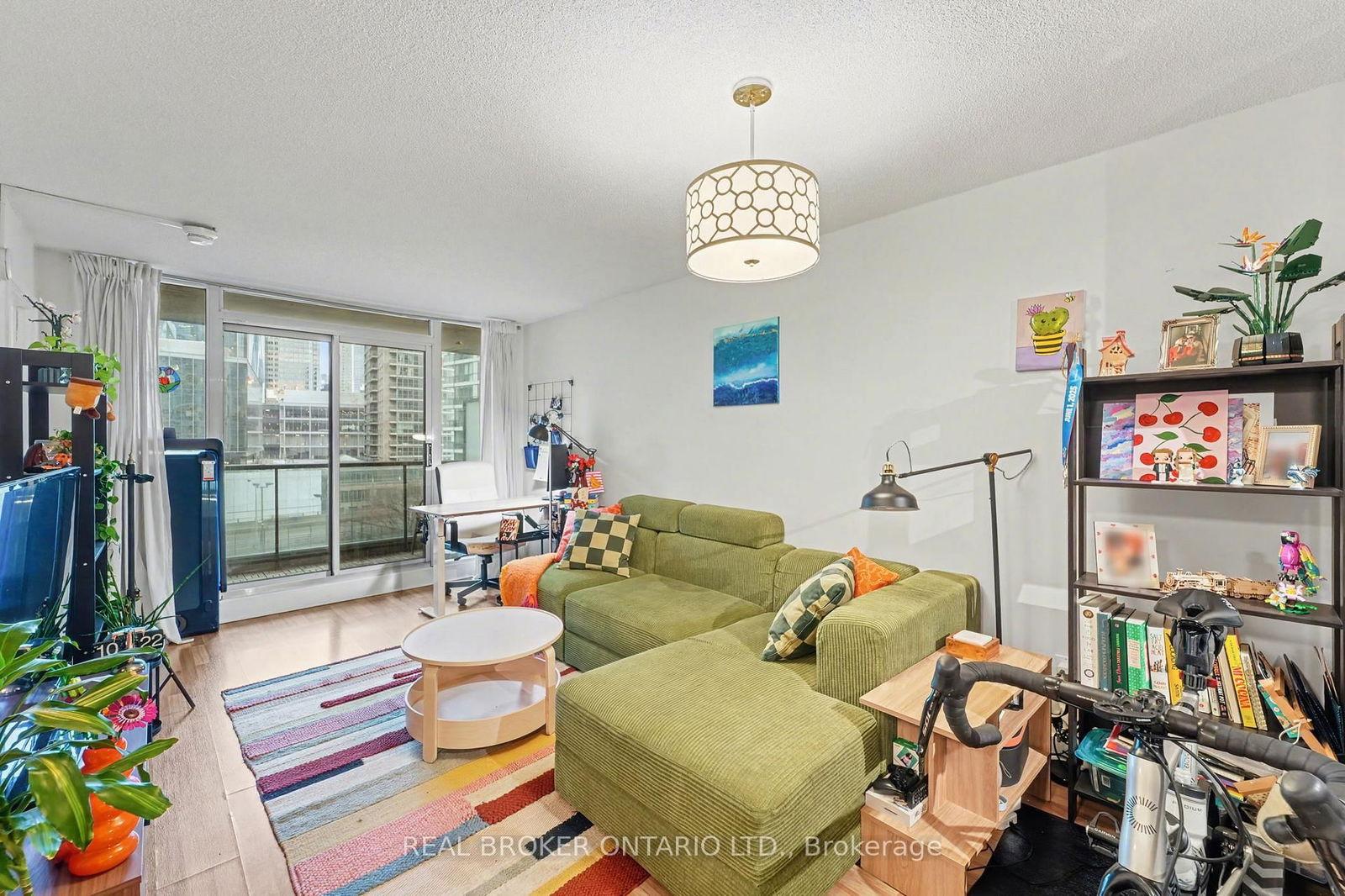 Living and dining area with city views