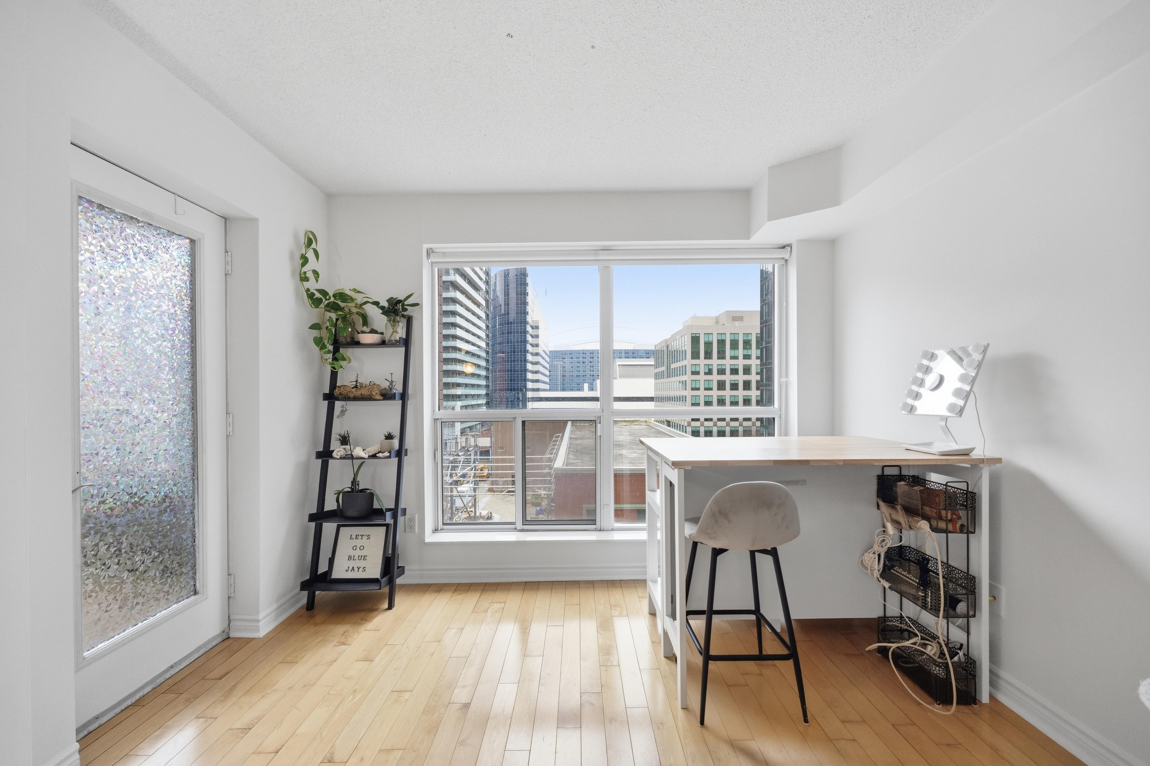 Dining area with balcony door and natural light