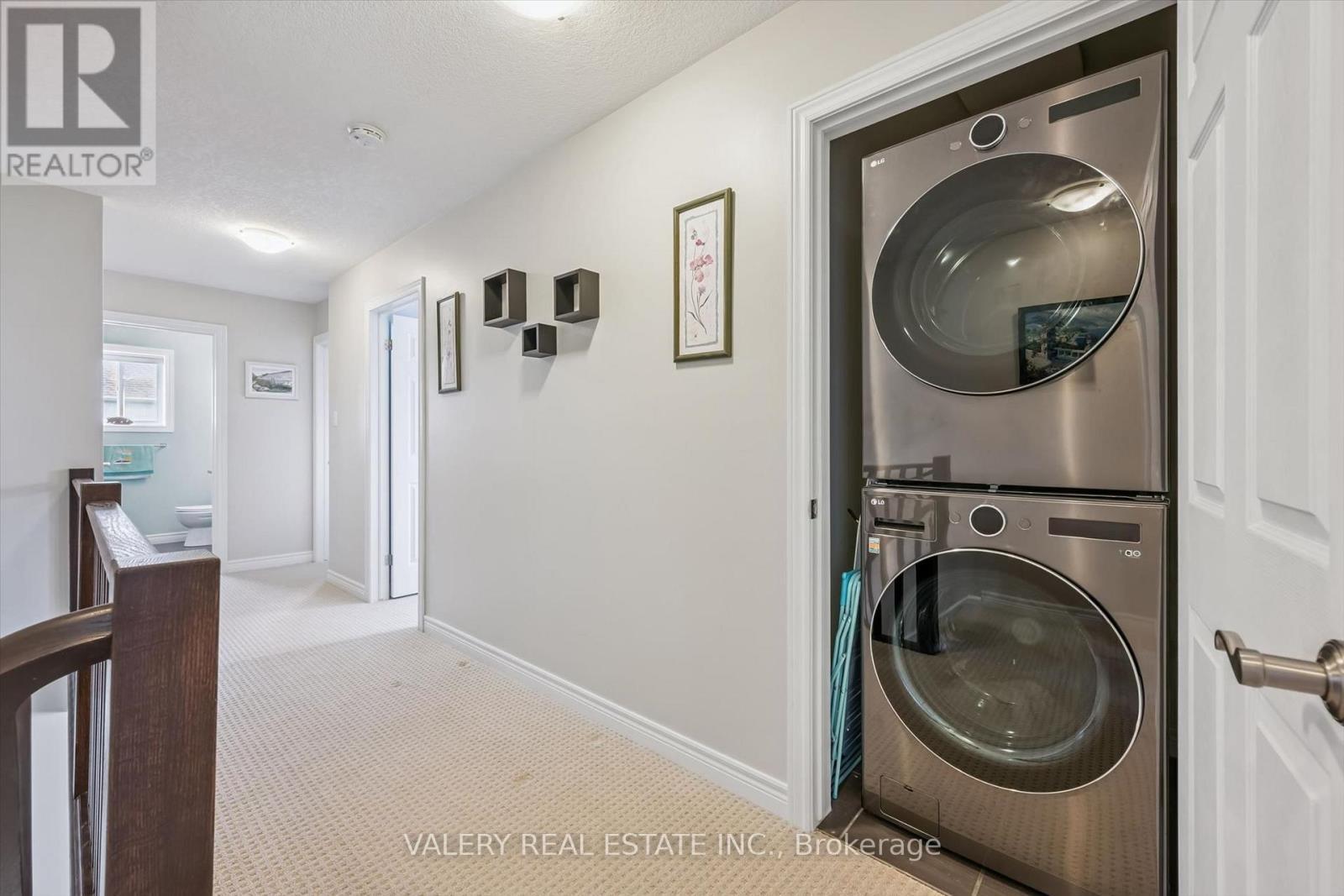Open kitchen and dining with stainless steel refrigerator