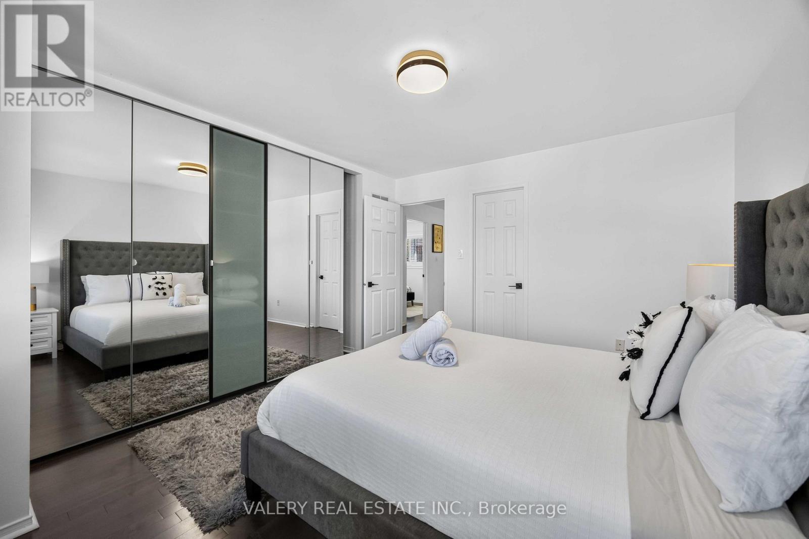 Bedroom with mirrored closet