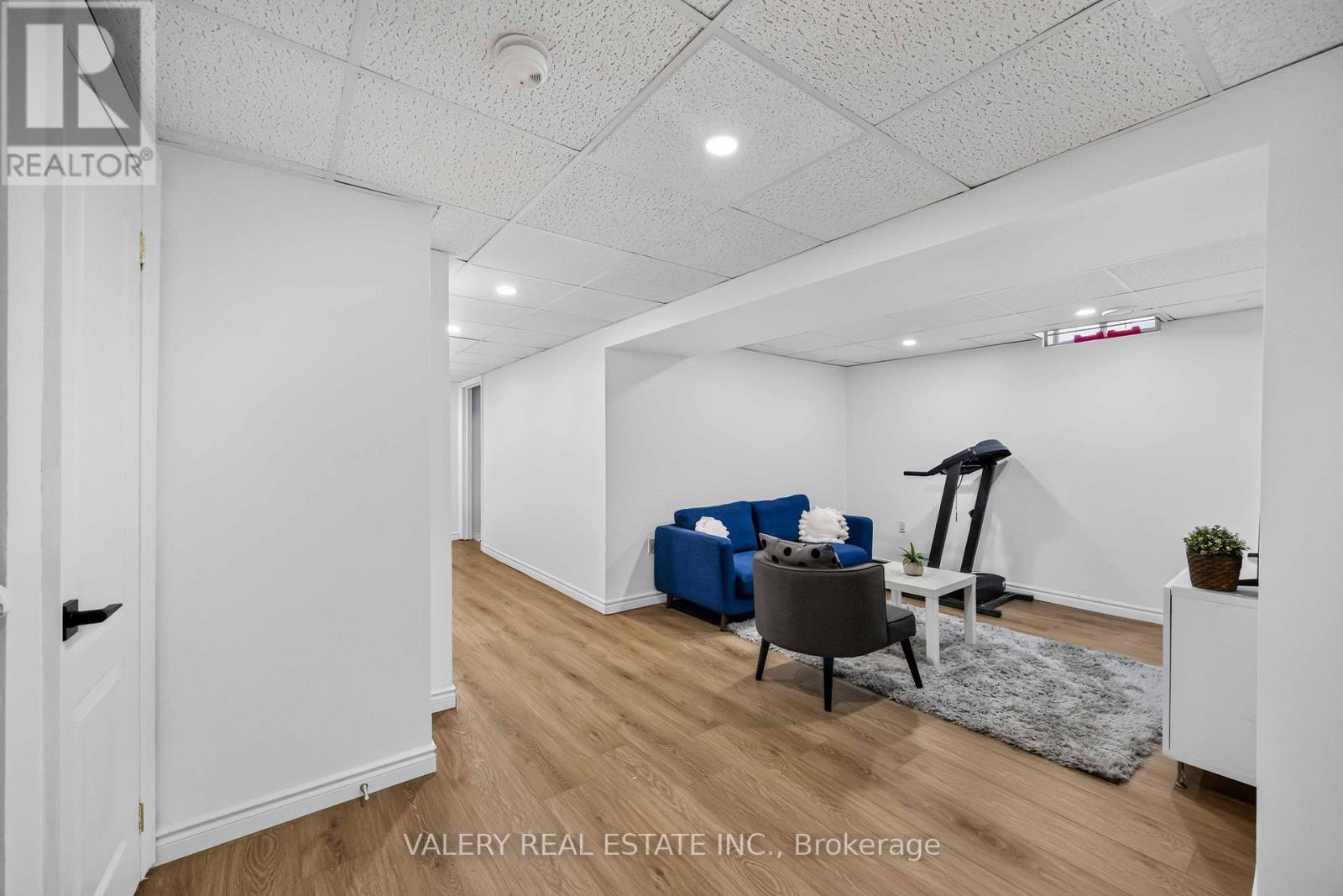 Basement rec room with seating