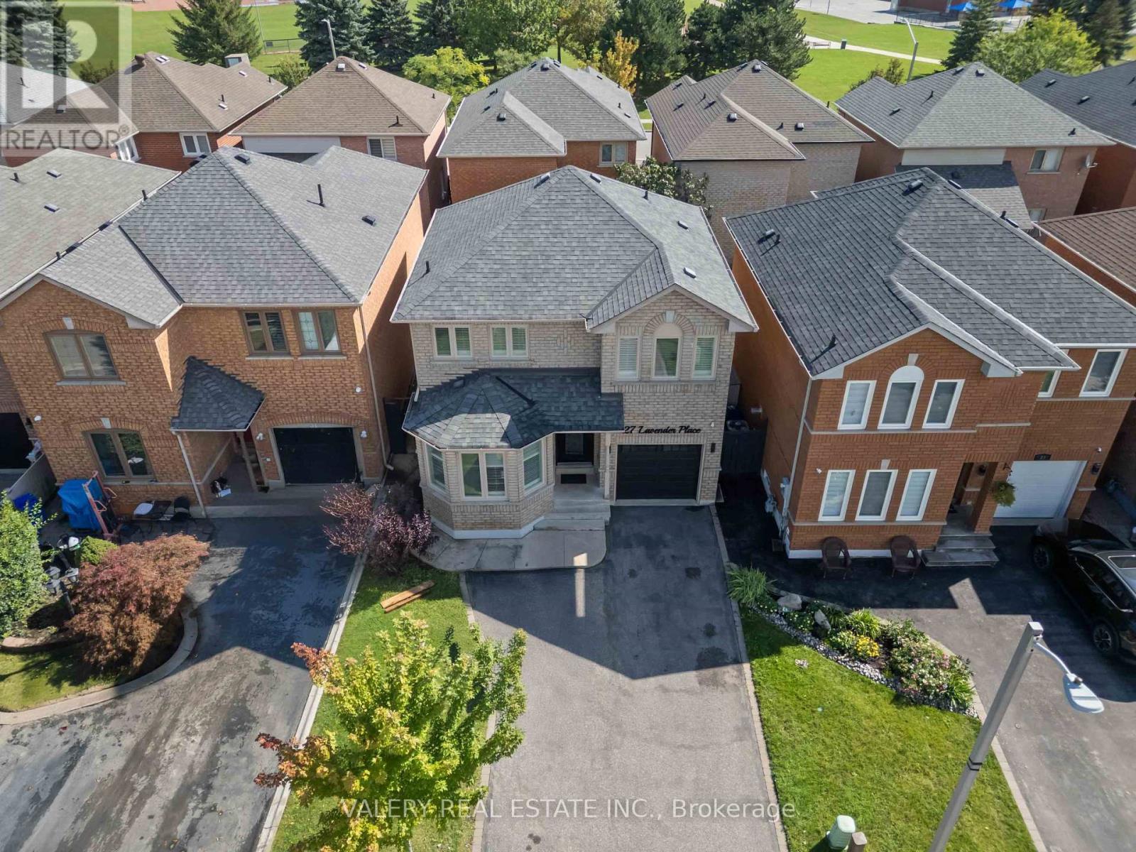 Aerial view of the home and neighbourhood