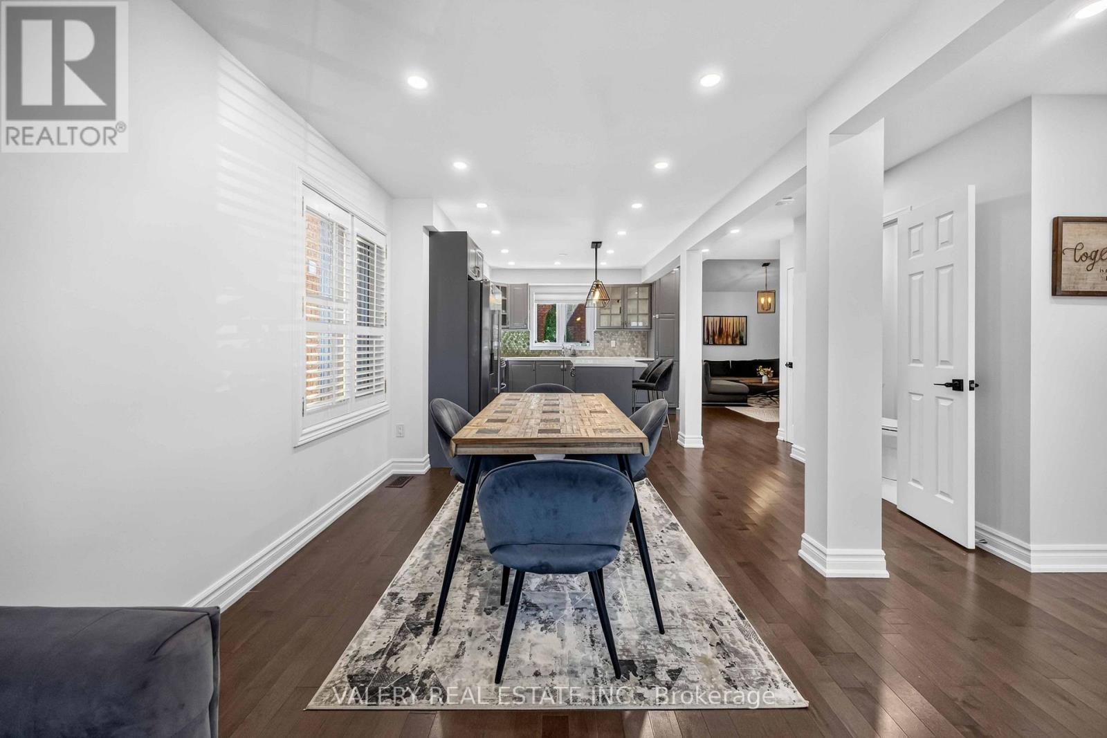 Dining area with hardwood flooring